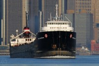 With the tall buildings of downtown Detroit as a backdrop, the Thunder Bay bound Algoma Montrealais is up on the Detroit River at Windsor.