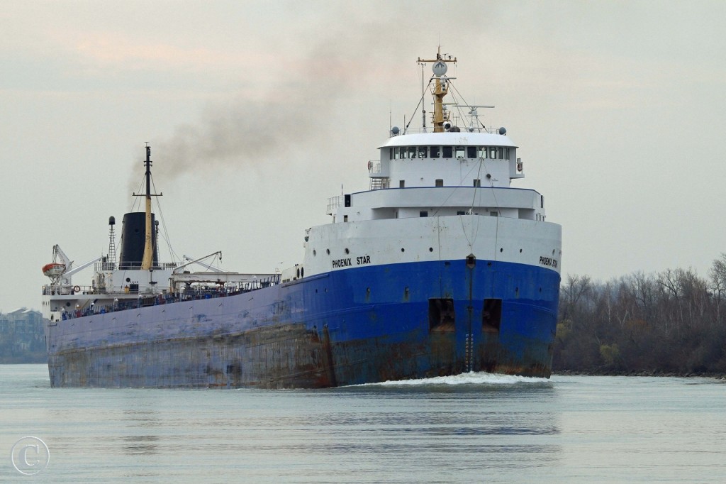 Destined to load wheat in Thunder Bay, the Phoenix Star is upbound through the Detroit River\'s Amherstburg Channel.