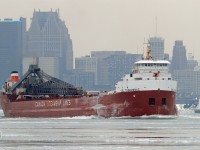 After fueling at Sterling Marine Fuels in Windsor, the CSL Tadoussac, under full power, charges upbound on the Detroit River destined for Superior Wisconsin.