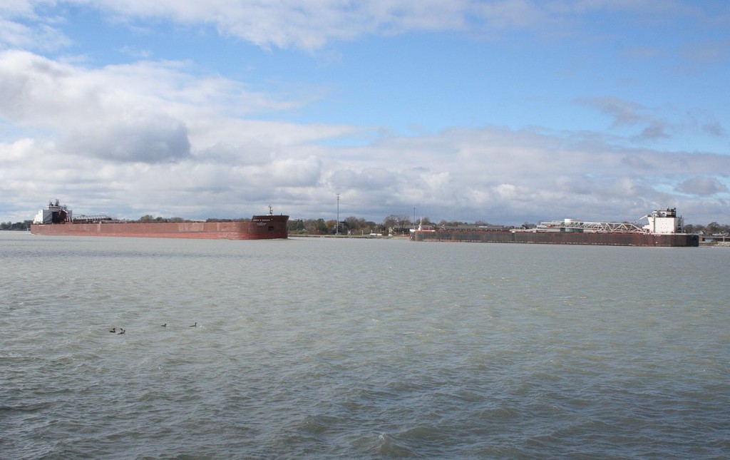 The 1004\' James R Barker, heading upriver, passes the smaller St. Clair on its namesake river at Sarnia, ON. The 1004\' James R Barker, heading upriver, passes the smaller St. Clair on its namesake river at Sarnia, ON.