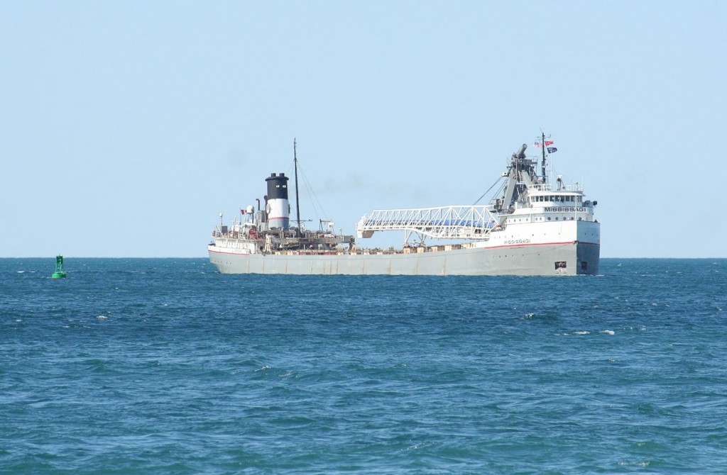 The Mississagi rounds the marker buoy on Lake Huron to enter the channel at the mouth of the St. Clair river.