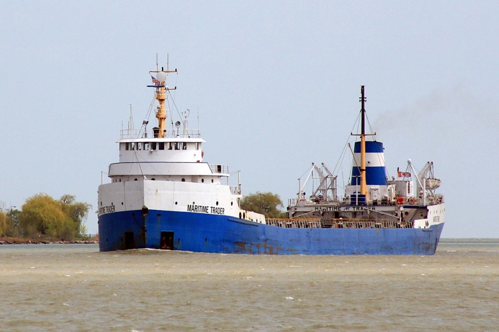 Loaded with Thunder Bay grain for Québec City, the Maritime Trader is downbound on the Detroit River at Windsor. She now works for Lower Lakes Towing out of Port Dover as the Manitoba.