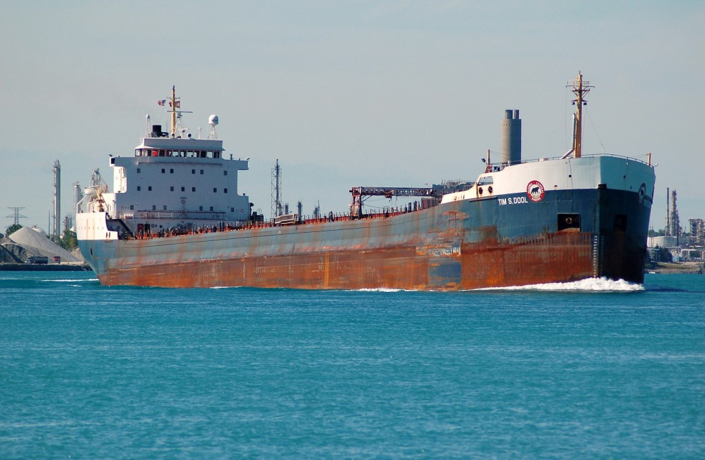 Tim S. Dool of the Algoma fleet sails upbound in the St. Clair river at Sarnia, one of the oddballs in the fleet having been built with all cabins aft but no self unloading equipment was ever installed.