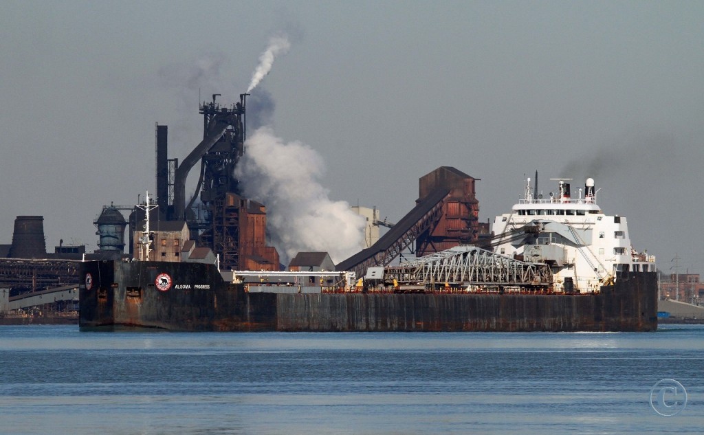 Built for the Upper Lakes fleet at the Port Weller Dry Docks as the Canadian Progress, the renamed Algoma Progress works her way down the Detroit River opposite Zug Island's US Steel Great Lakes Works.