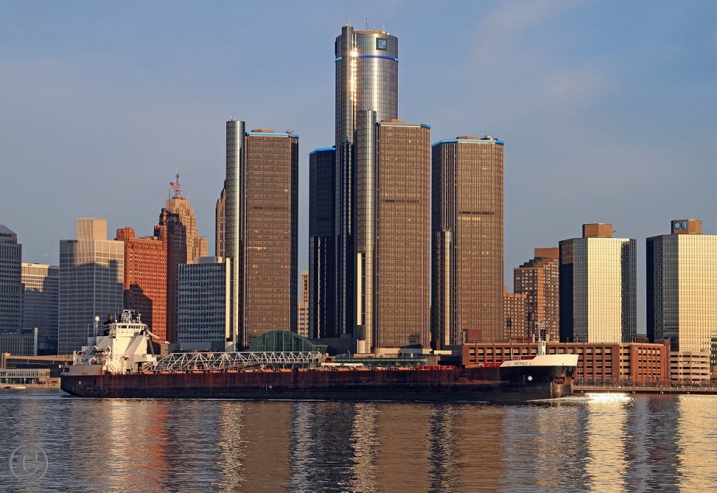The M/V Buffalo is named in honor of the home city of American Steamship Company, Buffalo, NY. Here, the Buffalo is upbound on the Detroit River at Windsor. GM's World Headquarters, the Renaissance Center, provides the backdrop. Detroit might be down at this point in history, but she's alive and kickin'. She'll survive and be a whole lot stronger in the future.