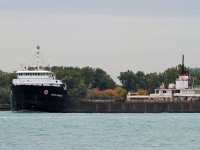 Built in 1963 at Canadian Vickers in Montreal for the Upper Lakes fleet as the Quebecois, the Algoma Quebecois, under the Algoma Central flag, sails downbound on the Detroit River for Quebec City. She was recently sent to the scrapper in Port Colborne. Another classic bites the dust.