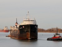 The "Dead Ship Tow" of Algoma Quebecois approaches the Homer Bridge (Bridge 4) of the Welland Canal after coming to a stop to allow the passage of CSL Niagara. Algoma Quebecois' final destination is the MRC/IMS scrap yard in Port Colborne where she will be dismantled and disposed of.
