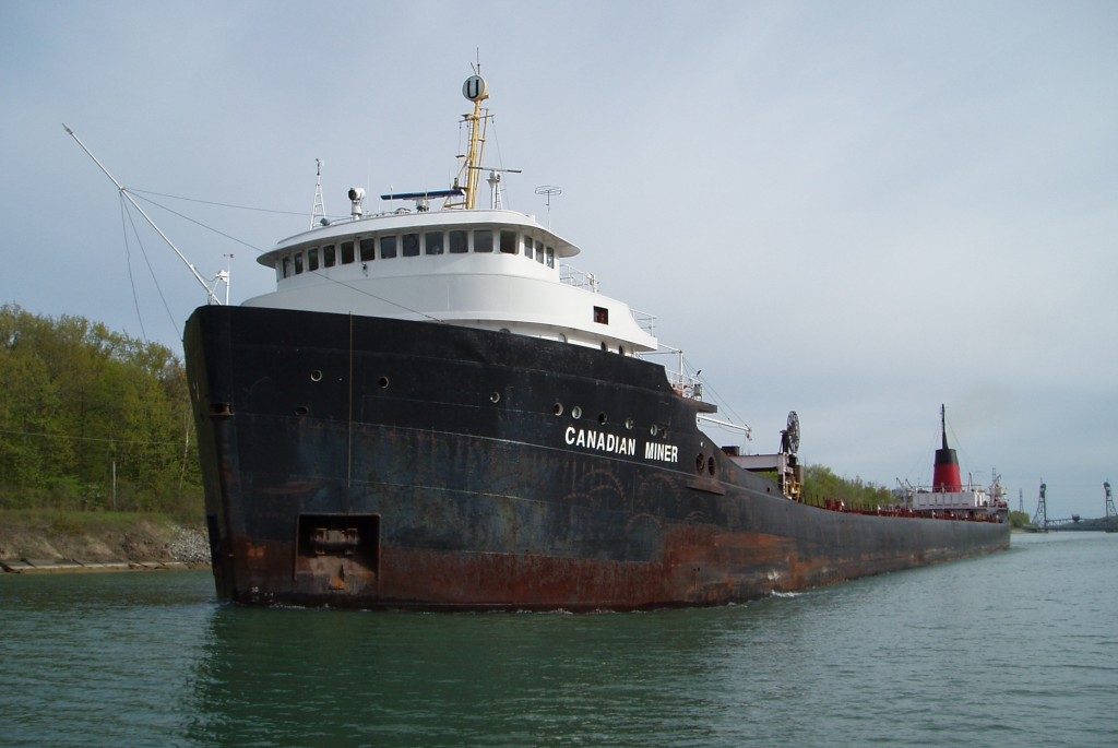 Having just gone under the Allanburg bridge. Canadian Miner is downbound in the Welland Canal for Lock 7.